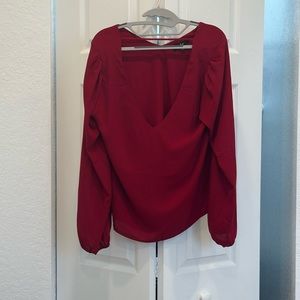 Red long sleeve blouse.